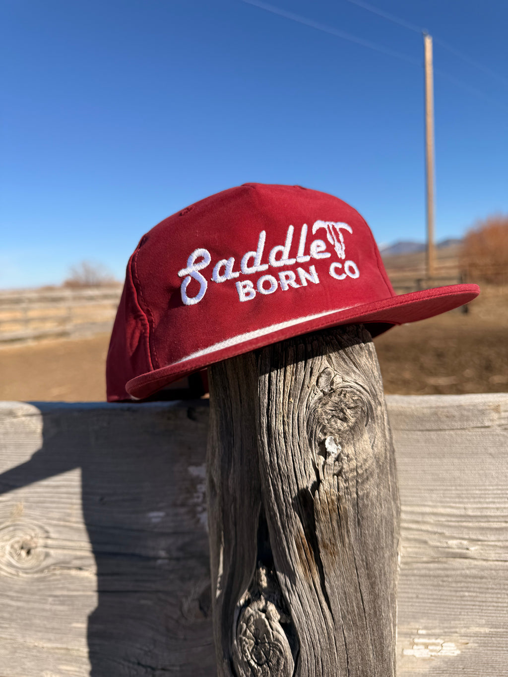 Saddle Born retro logo hat