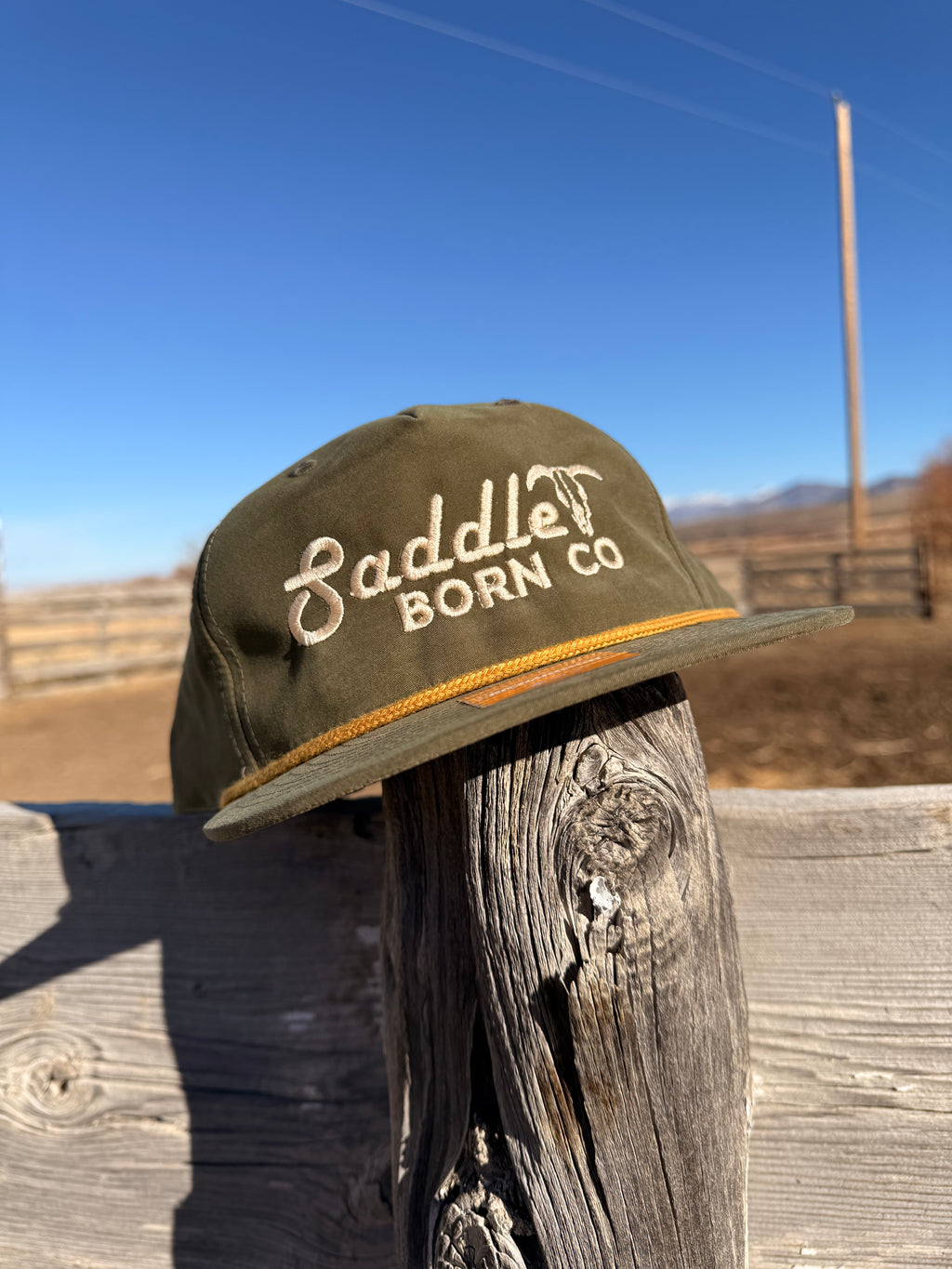Saddle Born retro logo hat