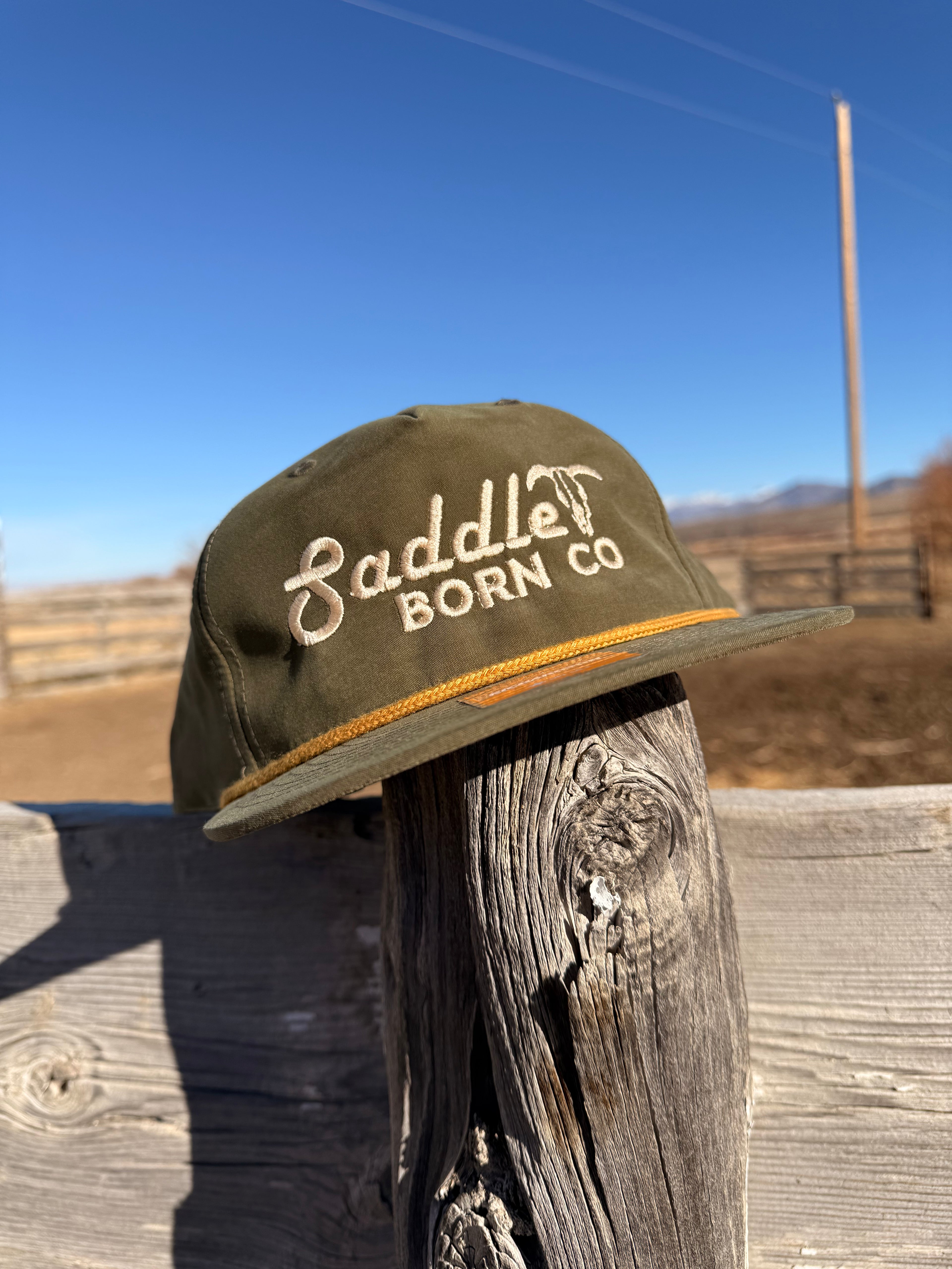 Saddle Born retro logo hat